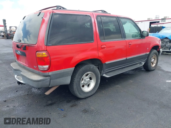 1999 Ford Explorer XLT z VIN 1FMZU35P5XZB62128, wystawiony jako IAAI lot #42635627 z przebiegiem 221 556 mil mil oraz . Historia ofert i sprzedaży dostępna na DreamBid. Obrazek 4.