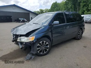 2003 Honda Odyssey EX with VIN 5FNRL18603B019988, listed as a Copart auction lot 65183145 with 167,615 mi miles and Salvage title. Bid and sale history available at DreamBid. Image 1.