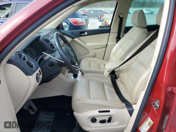 2011 Volkswagen Tiguan SE with VIN WVGBV7AX7BW001124, listed as a Copart auction lot 53044005 with 150,072 mi miles and Salvage Title. Bid and sale history available at DreamBid. Image 7.