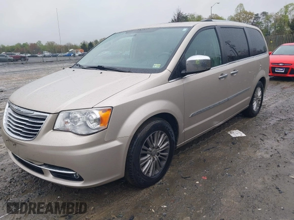 2013 Chrysler Town & Country Limited with VIN 2C4RC1GG2DR536256, listed as a IAAI auction lot 42027427 with 126,447 mi miles. Bid and sale history available at carsss.com. Image 2.