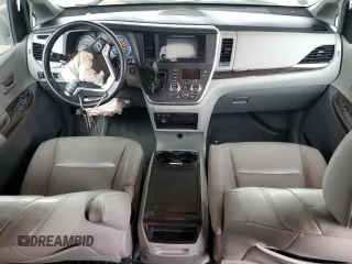 2016 Toyota Sienna XLE with VIN 5TDYK3DC8GS729616, listed as a Copart auction lot 59748995 with 144,469 mi miles and Salvage title. Bid and sale history available at DreamBid. Image 8.