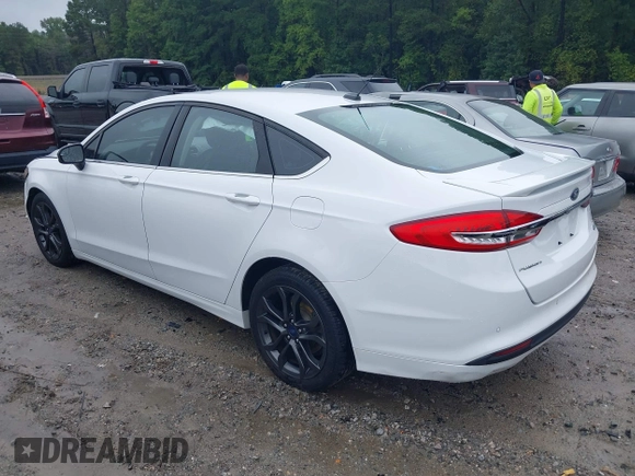 2018 Ford Fusion SE with VIN 3FA6P0HD6JR153230, listed as a IAAI auction lot 40336904 with 71,949 mi miles and . Bid and sale history available at DreamBid. Image 3.