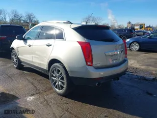 2015 Cadillac SRX Premium Collection with VIN 3GYFNDE35FS570576, listed as a IAAI auction lot 40922524 with 154,557 mi miles. Bid and sale history available at carsss.com. Image 3.