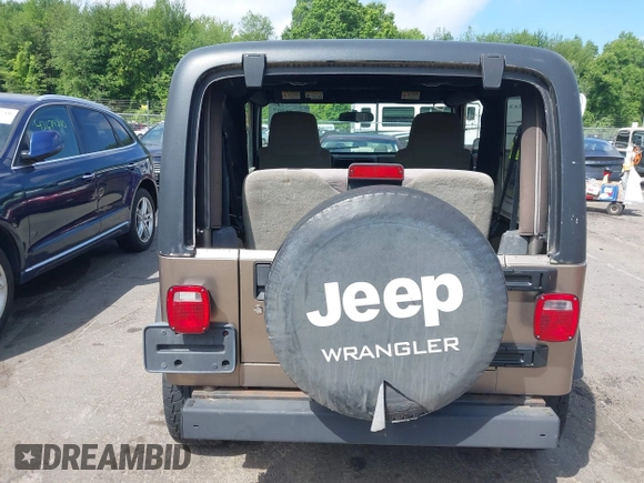 2005 Jeep Wrangler Sport with VIN 1J4FA49SX5P317120, listed as a IAAI auction lot 42677397 with 71,403 mi miles and . Bid and sale history available at DreamBid. Image 16.