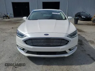 2017 Ford Fusion Titanium с VIN 3FA6P0K96HR161679, выставлен на аукционе Copart как лот 61237935 с пробегом 66 680 миль миль и Списание • Salvage title. История ставок и продаж доступна на DreamBid. Изображение 5.