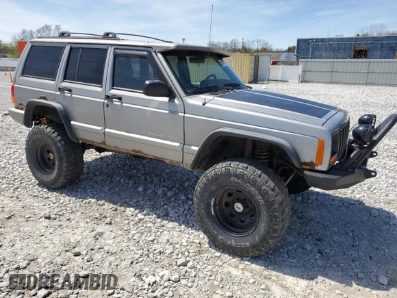 2000 Jeep Cherokee Classic with VIN 1J4FF58S0YL148245, listed as a Copart auction lot 53955735 with 185,307 mi miles and Clean Title. Bid and sale history available at carsss.com. Image 4.