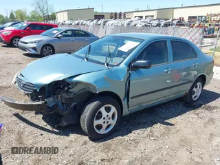 2005 Toyota Corolla CE with VIN 1NXBR32EX5Z373910, listed as a IAAI auction lot 42230582 with 64,004 mi miles and . Bid and sale history available at DreamBid. Image 2.