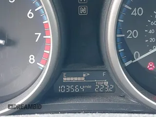 2013 Mazda 3 i Touring z VIN JM1BL1V72D1822505, wystawiony jako IAAI lot #42199595 z przebiegiem 103 560 mil mil oraz . Historia ofert i sprzedaży dostępna na DreamBid. Obrazek 15.