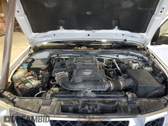 2011 Nissan Frontier Pro-4X с VIN 1N6AD0EV7BC411763, выставлен на аукционе Copart как лот 82966494 с пробегом 224 775 миль миль и Списание • Salvage title. История ставок и продаж доступна на DreamBid. Изображение 11.