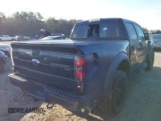2014 Ford F-150 SVT Raptor with VIN 1FTFW1R60EFC90847, listed as a IAAI auction lot 41823834 with 169,549 mi miles and . Bid and sale history available at carsss.com. Image 4.