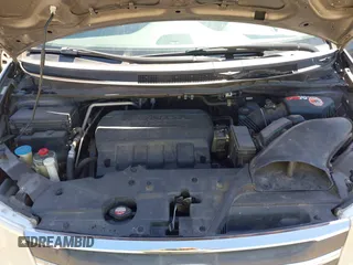 2012 Honda Odyssey Touring with VIN 5FNRL5H91CB057344, listed as a IAAI auction lot 41835272 with 158,854 mi miles. Bid and sale history available at carsss.com. Image 10.