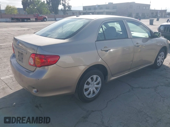 2009 Toyota Corolla with VIN 1NXBU40EX9Z065469, listed as a IAAI auction lot 42022537 with 179,819 mi miles. Bid and sale history available at carsss.com. Image 4.