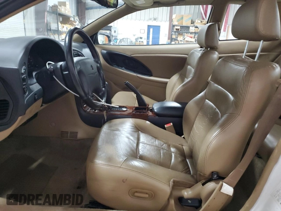 1998 Chrysler Sebring LXi z VIN 4C3AU52N6WE127896, wystawiony jako Copart lot #80051754 z przebiegiem 71 034 mil mil oraz Szkoda całkowita • Salvage title. Historia ofert i sprzedaży dostępna na DreamBid. Obrazek 7.