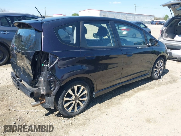 2013 Honda Fit Sport with VIN JHMGE8H59DC001939, listed as a IAAI auction lot 41885102 with 113,639 mi miles. Bid and sale history available at carsss.com. Image 4.