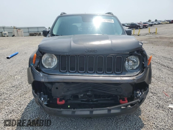 2016 Jeep Renegade Trailhawk with VIN ZACCJBCT5GPC75735, listed as a Copart auction lot 60299005 with 121,990 mi miles and Salvage title. Bid and sale history available at DreamBid. Image 5.