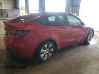 2023 Tesla Model Y Long Range z VIN 7SAYGAEE8PF701618, wystawiony jako Copart lot #57573875 z przebiegiem 39 463 mil mil oraz Szkoda całkowita • Salvage title. Historia ofert i sprzedaży dostępna na DreamBid. Obrazek 3.