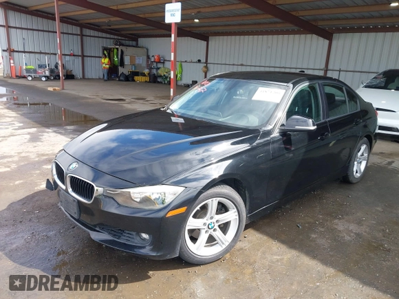 2015 BMW 3 Series 328i with VIN WBA3C1C53FK119723, listed as a IAAI auction lot 41871200 with 112,552 mi miles and . Bid and sale history available at carsss.com. Image 2.