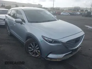 2018 Mazda CX-9 Touring with VIN JM3TCBCY0J0222130, listed as a IAAI auction lot 41923163 with 87,092 mi miles and . Bid and sale history available at DreamBid. Image 1.