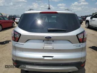 2018 Ford Escape Titanium with VIN 1FMCU9J99JUC89677, listed as a Copart auction lot 60421545 with 98,021 mi miles and Salvage title. Bid and sale history available at DreamBid. Image 6.