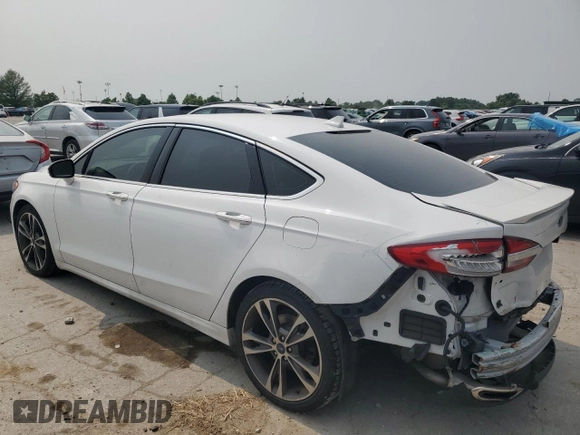2019 Ford Fusion Titanium with VIN 3FA6P0K91KR217096, listed as a Copart auction lot 57796185 with 84,128 mi miles and Salvage title. Bid and sale history available at DreamBid. Image 2.