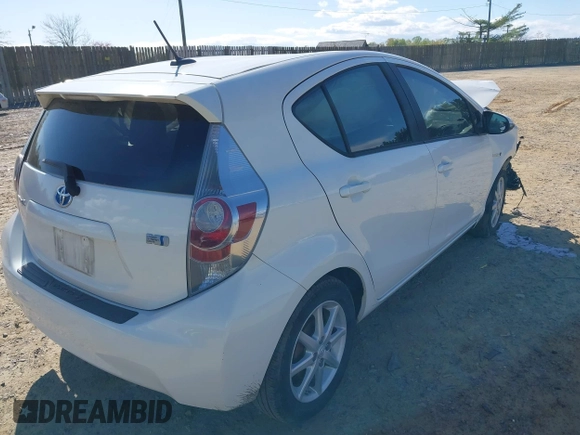 2012 Toyota Prius c One with VIN JTDKDTB33C1511612, listed as a IAAI auction lot 42027076 with 134,618 mi miles. Bid and sale history available at carsss.com. Image 4.