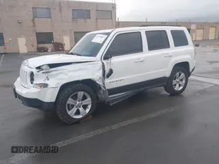2014 Jeep Patriot Sport with VIN 1C4NJRBB3ED509117, listed as a IAAI auction lot 41799057 with 161,663 mi miles. Bid and sale history available at carsss.com. Image 2.
