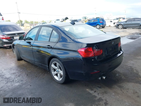 2015 BMW 3 Series 328i with VIN WBA3C1C53FK119723, listed as a IAAI auction lot 41871200 with 112,552 mi miles and . Bid and sale history available at carsss.com. Image 3.
