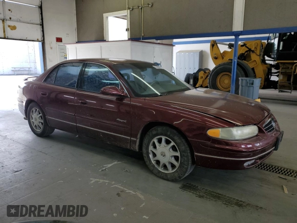 1999 Buick Regal LS with VIN 2G4WB52K5X1481650, listed as a Copart auction lot 61439375 with Not provided miles and Salvage title. Bid and sale history available at DreamBid. Image 4.