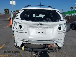 2013 Kia Sorento SX z VIN 5XYKW4A29DG325731, wystawiony jako IAAI lot #42300890 z przebiegiem 62 410 mil mil oraz . Historia ofert i sprzedaży dostępna na DreamBid. Obrazek 6.