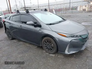 2018 Toyota Prius Plus with VIN JTDKARFPXJ3102985, listed as a IAAI auction lot 41514838 with 123,194 mi miles and . Bid and sale history available at DreamBid. Image 1.