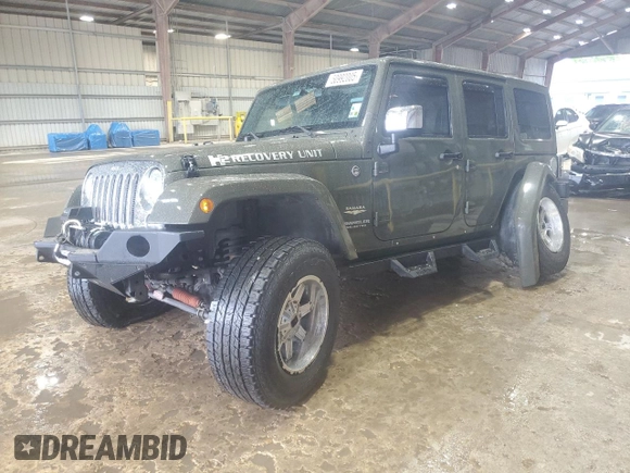 2015 Jeep Wrangler Unlimited Sahara with VIN 1C4HJWEG2FL639593, listed as a Copart auction lot 50992005 with 59,493 mi miles and Salvage Title. Bid and sale history available at carsss.com. Image 1.