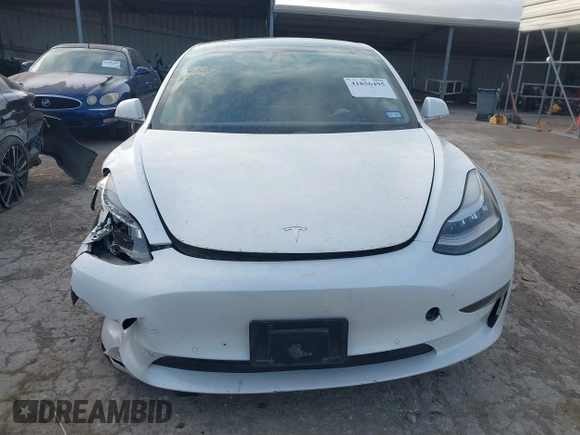 2020 Tesla Model 3 Standard Range Plus z VIN 5YJ3E1EA1LF660611, wystawiony jako IAAI lot #41856495 z przebiegiem 141 086 mil mil oraz . Historia ofert i sprzedaży dostępna na DreamBid. Obrazek 11.
