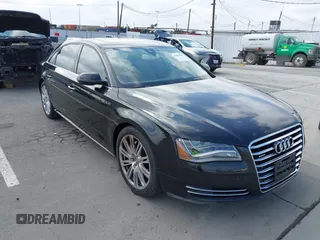 2013 Audi A8 3.0L z VIN WAURGAFD3DN005931, wystawiony jako IAAI lot #42461062 z przebiegiem 113 899 mil mil oraz . Historia ofert i sprzedaży dostępna na DreamBid. Obrazek 1.