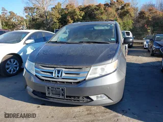 2013 Honda Odyssey Touring with VIN 5FNRL5H9XDB009973, listed as a IAAI auction lot 41904710 with 219,067 mi miles. Bid and sale history available at carsss.com. Image 12.
