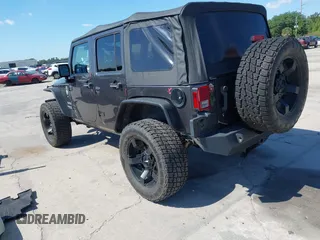 2014 Jeep Wrangler Unlimited Sport with VIN 1C4BJWDG4EL295044, listed as a IAAI auction lot 41997837 with 143,447 mi miles. Bid and sale history available at carsss.com. Image 14.