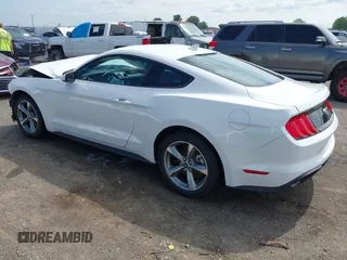 2021 Ford Mustang EcoBoost with VIN 1FA6P8THXM5153232, listed as a IAAI auction lot 42458757 with 45,267 mi miles and . Bid and sale history available at DreamBid. Image 3.