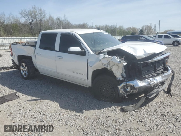 2017 Chevrolet Silverado 1500 LT with VIN 3GCPCREC4HG129055, listed as a Copart auction lot 50312855 with 121,334 mi miles and Salvage Title. Bid and sale history available at carsss.com. Image 4.