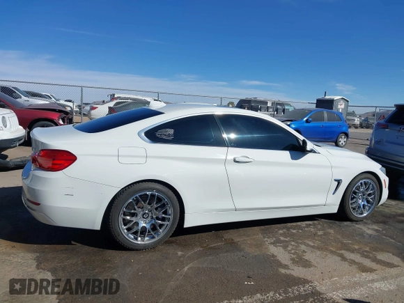 2015 BMW 4 Series 428i with VIN WBA3N3C51FK232902, listed as a IAAI auction lot 41547137 with 136,306 mi miles and . Bid and sale history available at DreamBid. Image 13.