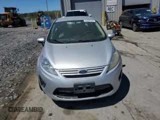 2012 Ford Fiesta S with VIN 3FADP4AJ5CM145540, listed as a Copart auction lot 55266155 with 214,090 mi miles and Clean Title. Bid and sale history available at carsss.com. Image 5.