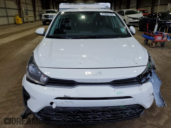 2023 Kia Rio LX with VIN 3KPA24ADXPE615843, listed as a Copart auction lot 47660125 with 27,841 mi miles and Salvage Title. Bid and sale history available at DreamBid. Image 5.