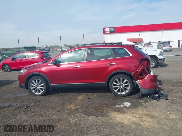 2015 Mazda CX-9 Grand Touring with VIN JM3TB3DA7F0448943, listed as a IAAI auction lot 41888414 with 104,052 mi miles. Bid and sale history available at carsss.com. Image 14.