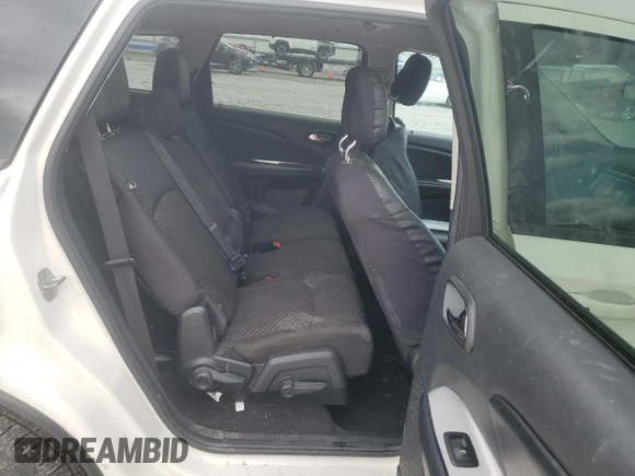 2013 Dodge Journey SXT with VIN 3C4PDDBG1DT619798, listed as a Copart auction lot 51820685 with 209,404 mi miles and Salvage Title. Bid and sale history available at DreamBid. Image 11.