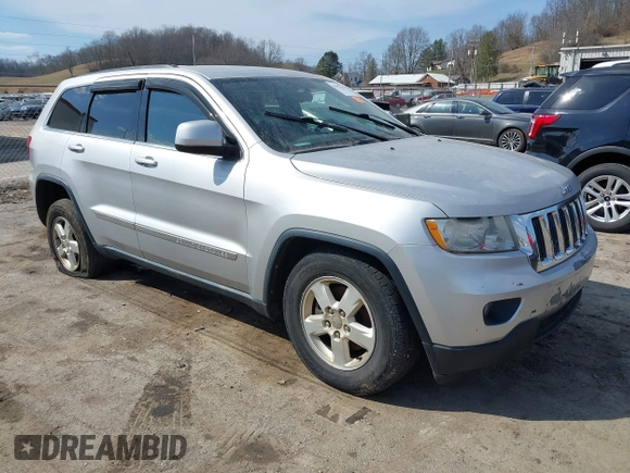 2013 Jeep Grand Cherokee Laredo with VIN 1C4RJFAG5DC634685, listed as a IAAI auction lot 41792147 with 260,594 mi miles. Bid and sale history available at carsss.com. Image 1.