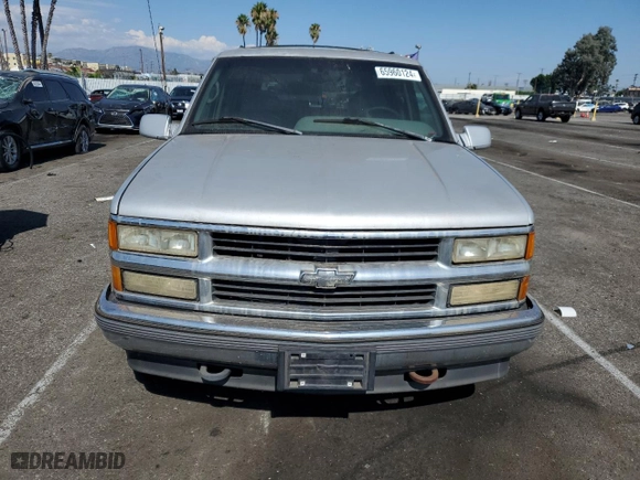1995 Chevrolet Tahoe with VIN 1GNEK13K6SJ415105, listed as a Copart auction lot 65960124 with 219,821 mi miles and Salvage Title. Bid and sale history available at carsss.com. Image 5.