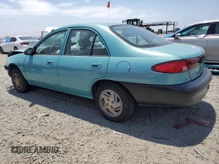 1999 Ford Escort LX with VIN 1FAFP10P6XW196483, listed as a Copart auction lot 59215635 with 74,859 mi miles and Salvage title. Bid and sale history available at DreamBid. Image 2.