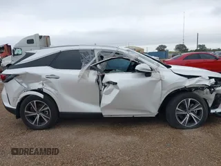 2023 Lexus RX 350 z VIN 2T2BAMBA1PC019509, wystawiony jako IAAI lot #42086133 z przebiegiem 37 861 mil mil oraz . Historia ofert i sprzedaży dostępna na DreamBid. Obrazek 13.