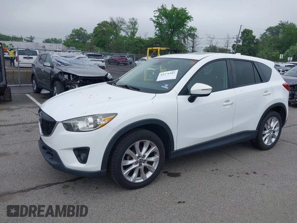 2015 Mazda CX-5 Grand Touring with VIN JM3KE4DY5F0530854, listed as a IAAI auction lot 42274582 with 144,732 mi miles and . Bid and sale history available at DreamBid. Image 17.
