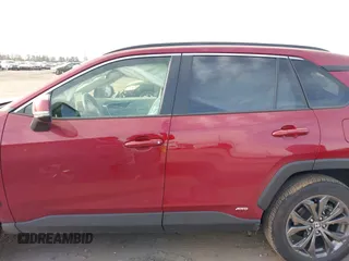 2023 Toyota RAV4 Hybrid XLE Premium z VIN JTMB6RFV8PD114927, wystawiony jako IAAI lot #41844127 z przebiegiem 14 582 mil mil oraz . Historia ofert i sprzedaży dostępna na DreamBid. Obrazek 14.