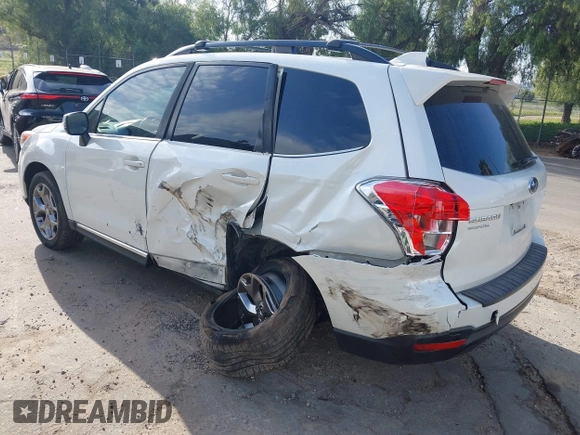 2016 Subaru Forester Touring with VIN JF2SJAXC7GH565287, listed as a IAAI auction lot 41947083 with 126,563 mi miles and . Bid and sale history available at DreamBid. Image 3.