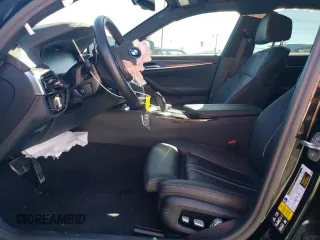 2023 BMW 5 Series M550i xDrive with VIN WBA13BK03PCM44838, listed as a Copart auction lot 68434874 with 17,798 mi miles and Salvage title. Bid and sale history available at DreamBid. Image 7.